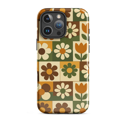 Product mockuGrid pattern of 70s retro flowers in mustard yellow, orange, and green for a vintage-style deelulu iPhone case design. deelulu